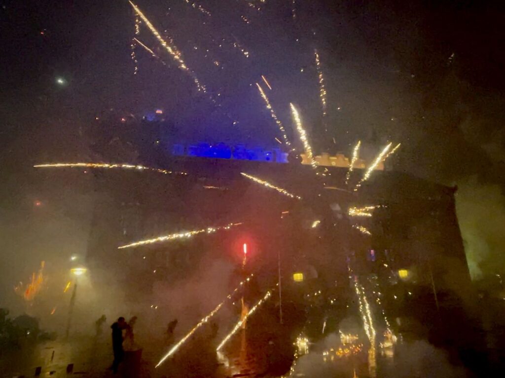 Copenhagen New Year celebrations at City Hall Square - bursting crackers