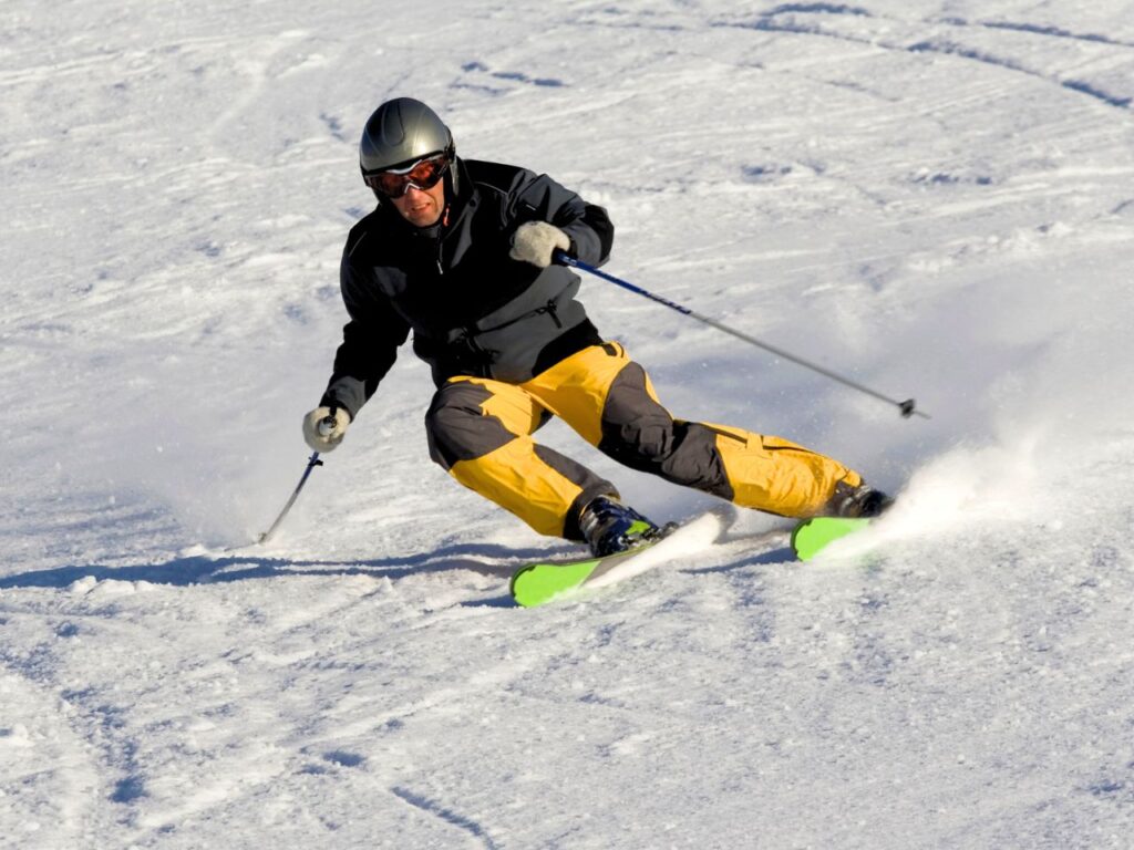 A guy skiing in Denmark on a downhill slope