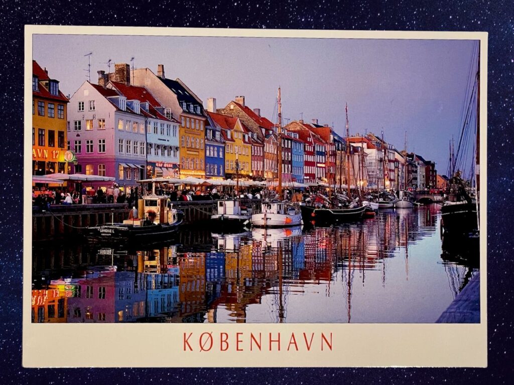 postcard souvenir from Denmark, featuring the Nyhavn canals of Copenhagen