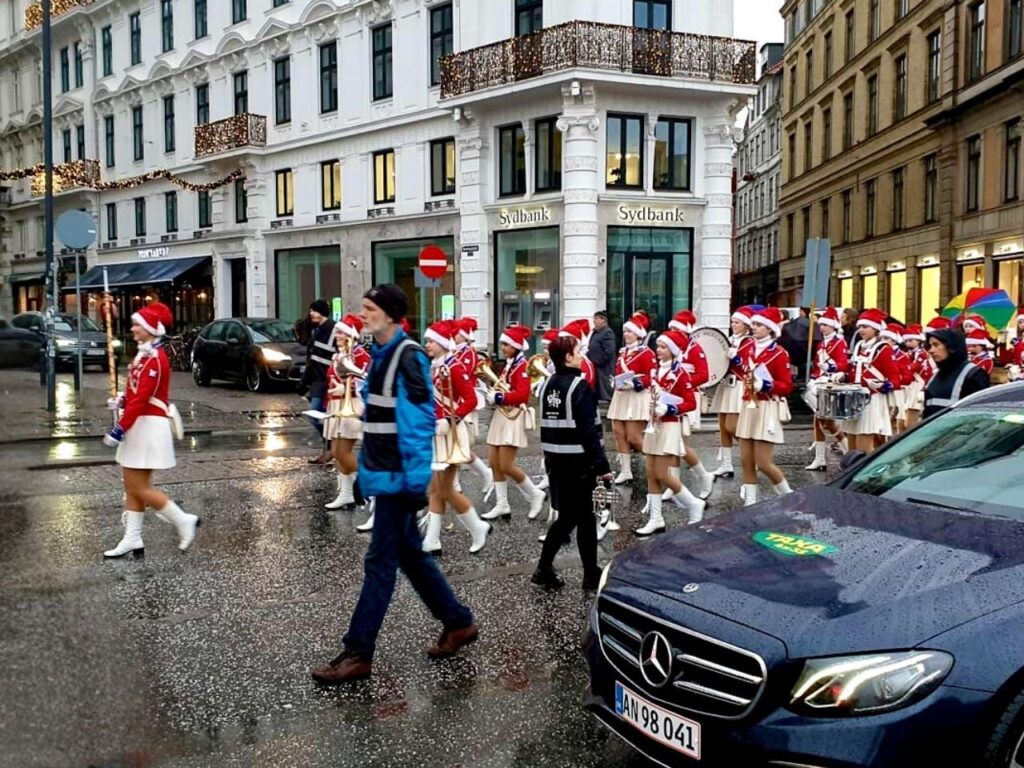 Elf kids or girls marching on the Christmas tree lighting parade to City Hall Sqaure