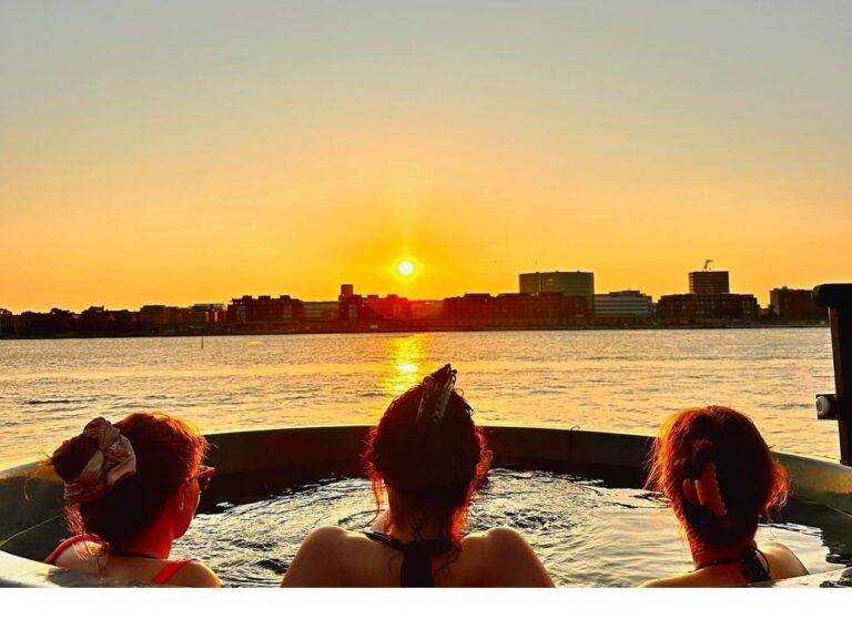 Girls watching sunset while enjoying sauna sessions at Hottub Copenhagen