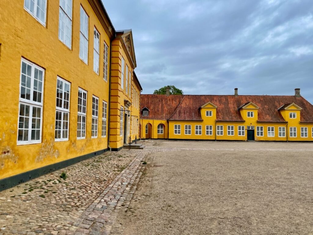 Yellow colored historic building of Roskilde Palace