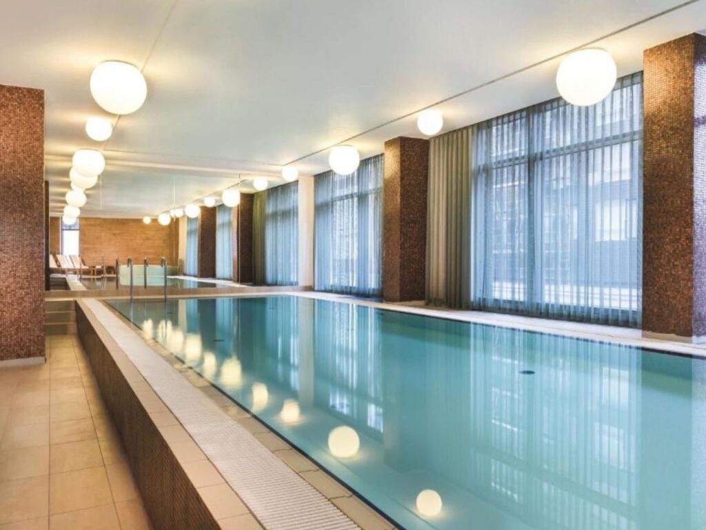 Indoor swimming pool at Adina apartment hotel