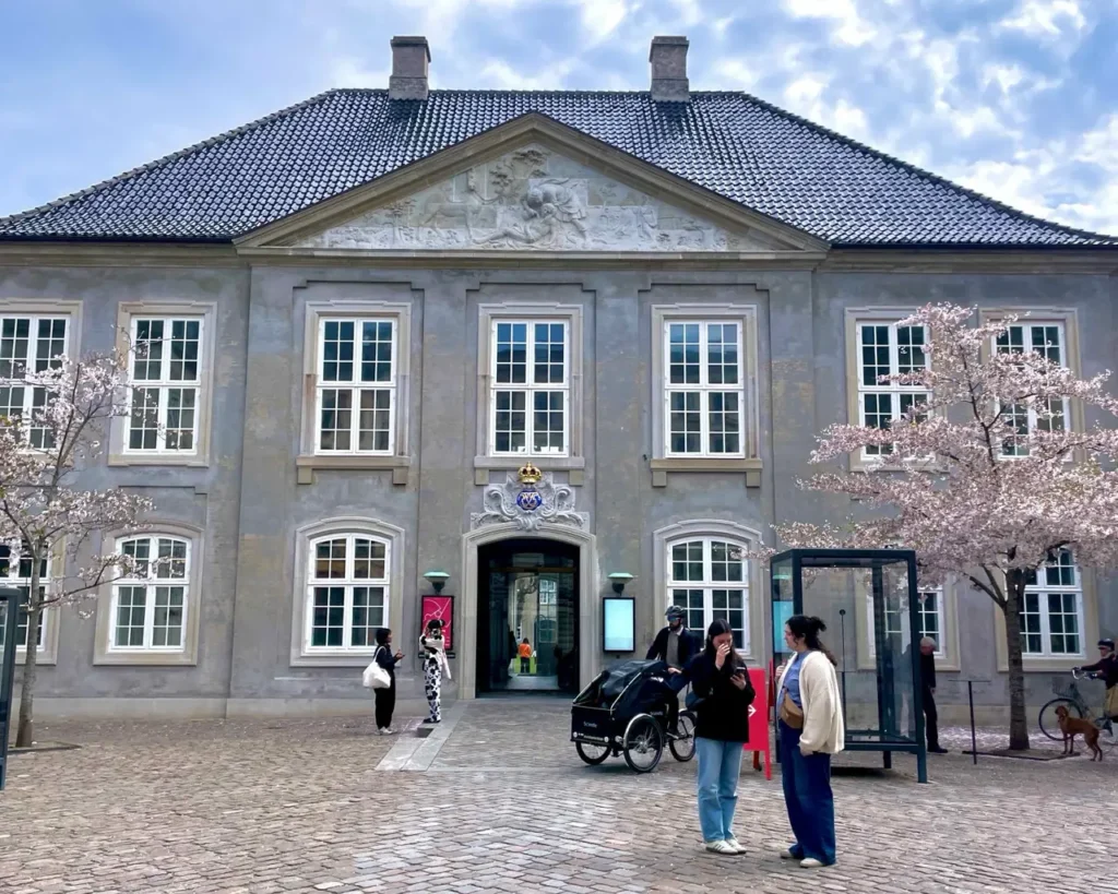 People conversing near the entrance of the Danish design museum