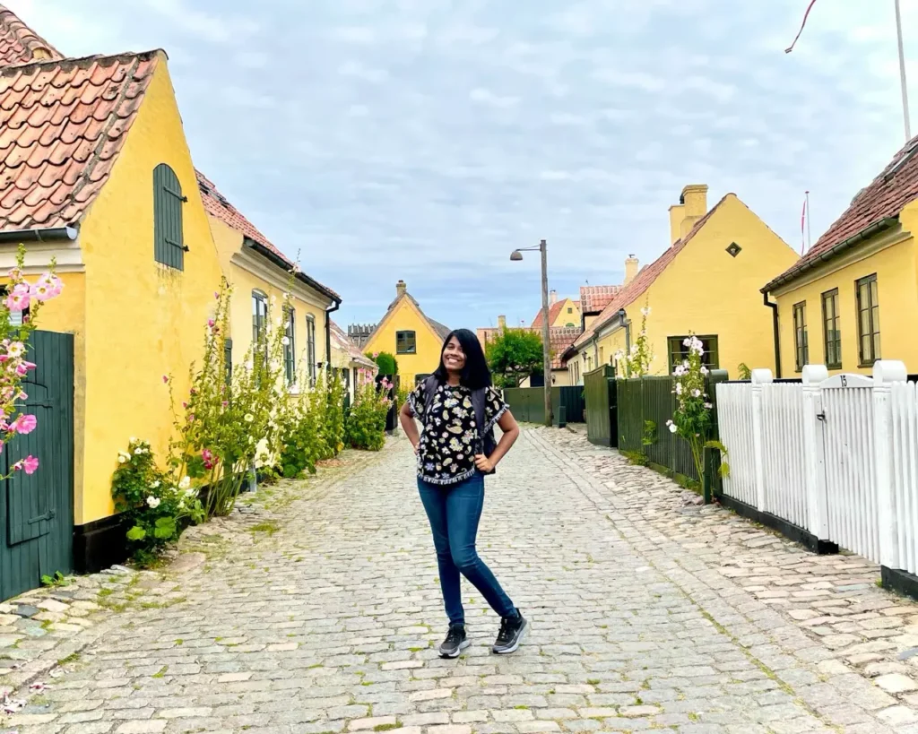 Agalya posing in front of Yellow house at Dragor old town