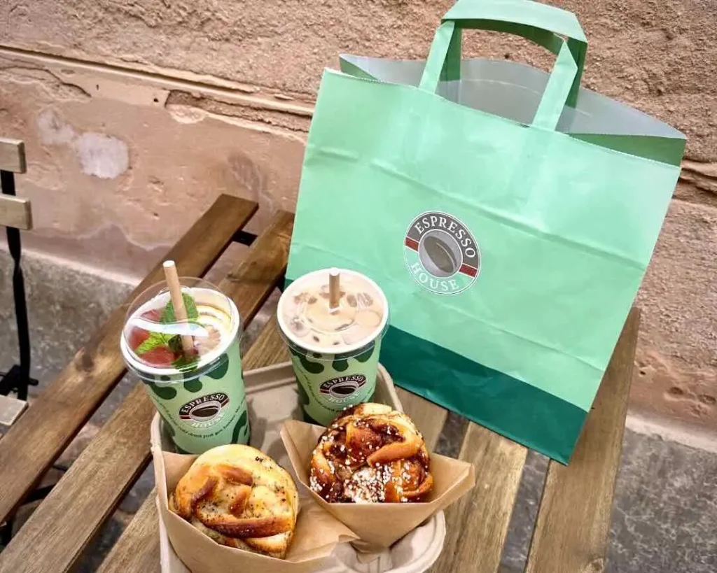 Pastries and cold drinks from Expresso house on a table