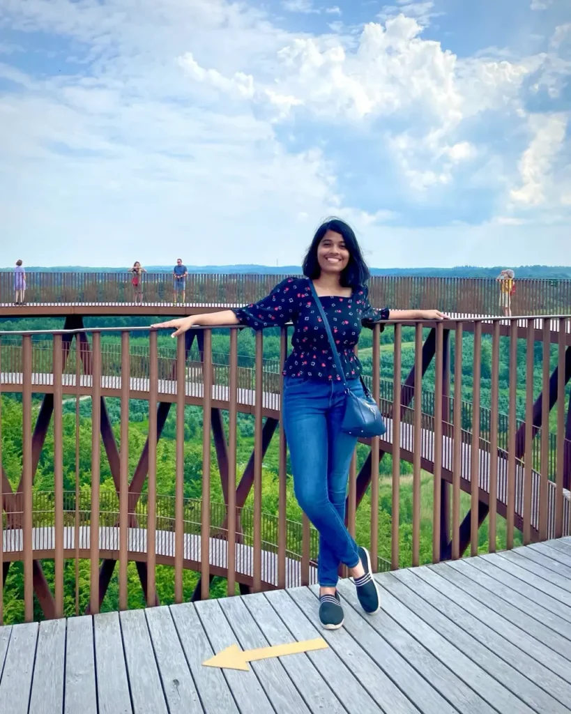 Agalya standing at the Forest Tower top