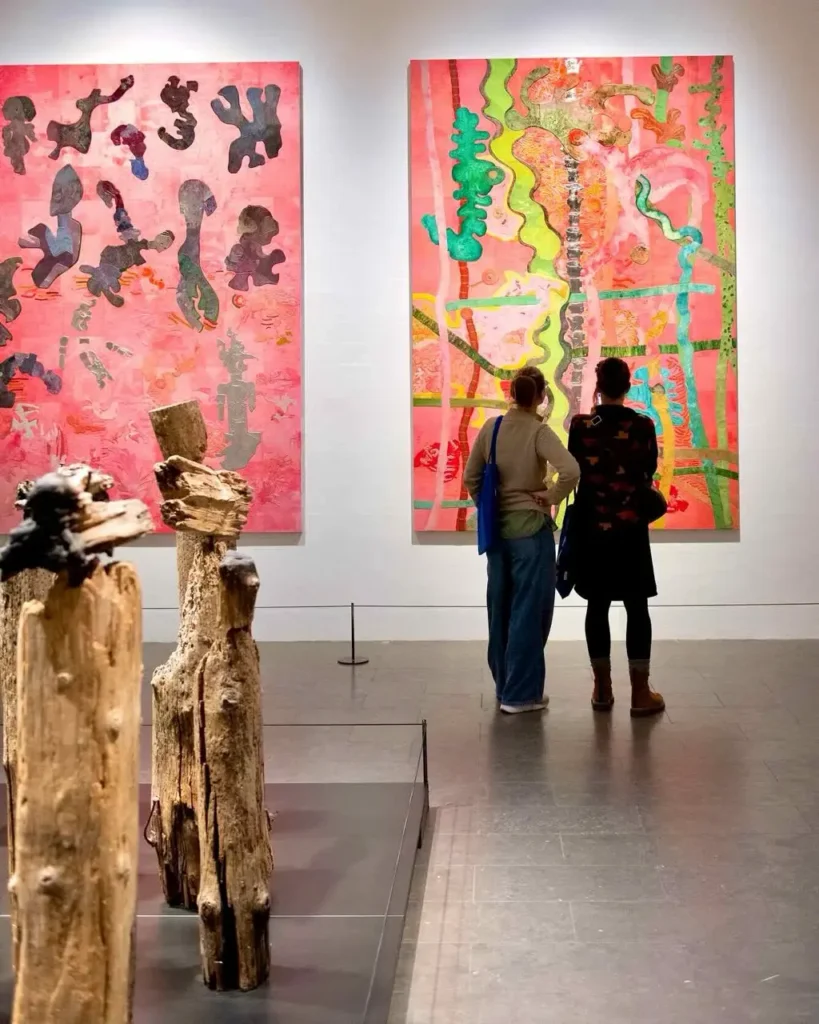 Two girls admiring artworks at louisiana museum of modern art